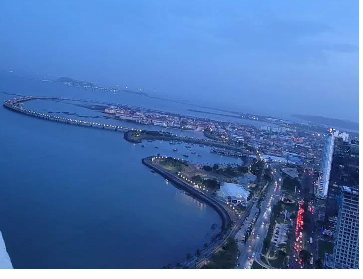 Aerial view of Panama City at dusk, with the skyline, old town and bay