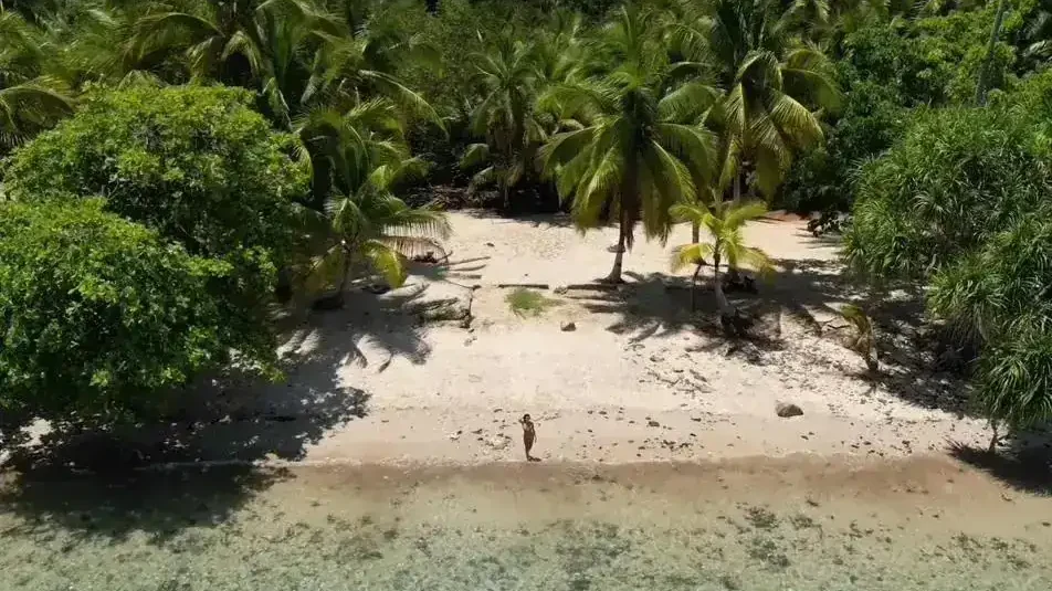 Turquoise water and a white-sand beach in Coiba National Park, Panama