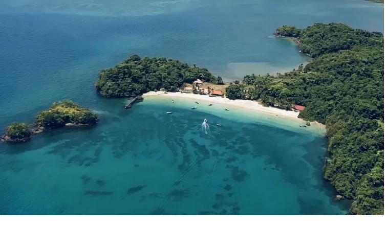 Aerial view of clear turquoise water, reefs and islets in Coiba National Park, Panama