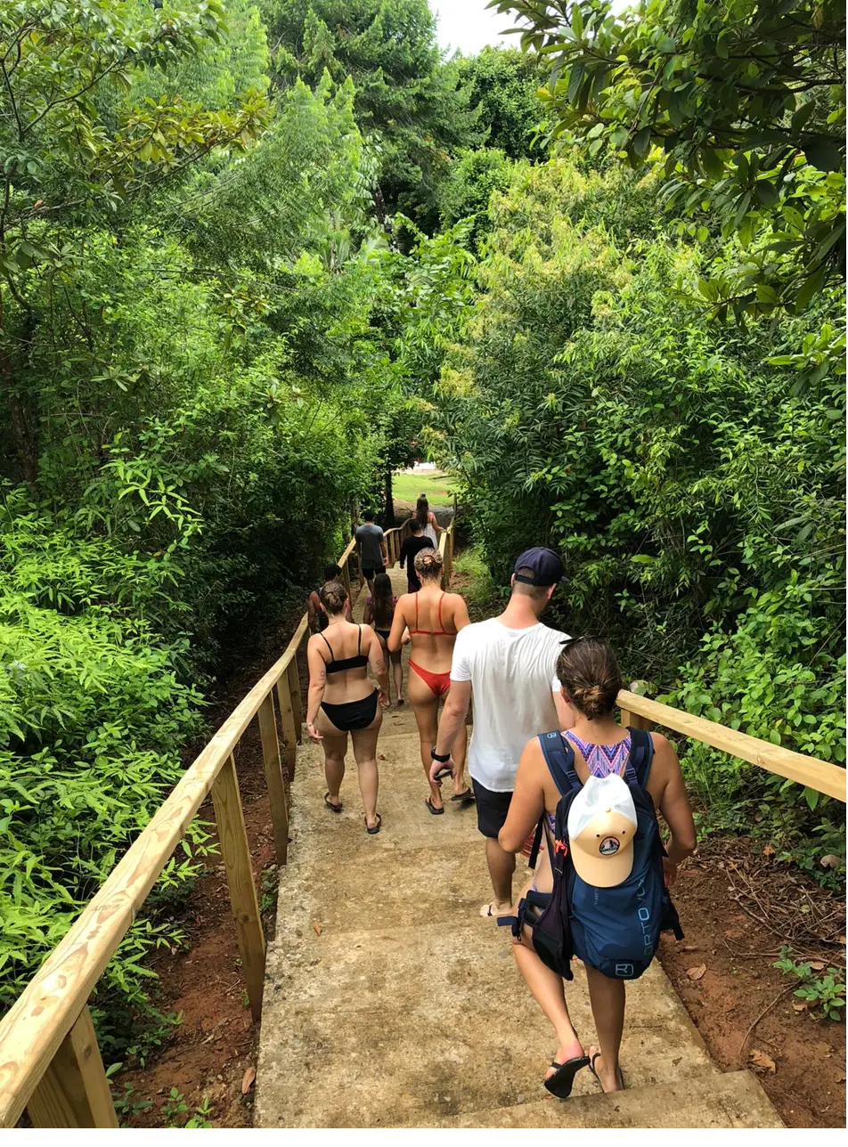 A group of travelers walking together on a Coiba day tour, Panama