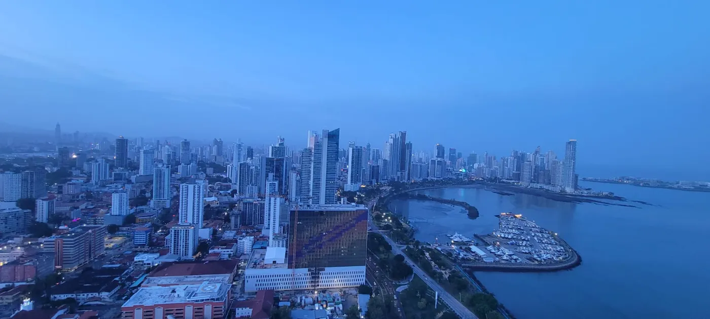 Panama City skyline and bay at dusk — modern towers along the Pacific coast